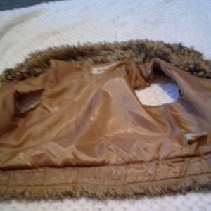 Brown furry vest